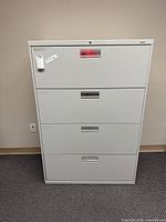 Front view of HON 4-drawer lateral file cabinet