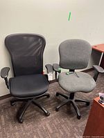 front view showing both chairs and damaged arm