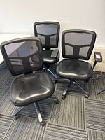 All three chairs grouped showing mesh backs, seats and bases