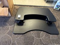 Black Varidesk desk converter folded flat