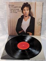 Front jacket and vinyl disc showing red Columbia label