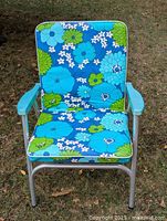 Front view of aluminum lawn chair showing full cushion and frame