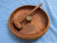 overall view of wood nut dish and hammer