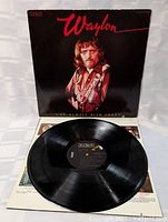 Front cover showing album art and title