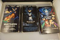 Front covers of three Batman VHS tapes
