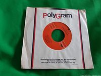 Front of sleeve showing PolyGram branding and record centre hole