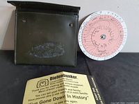 Case, calculator and leaflet overall view