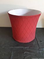Red quilted fabric lampshade exterior view