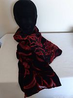 Scarf displayed on mannequin showing overall color and pattern