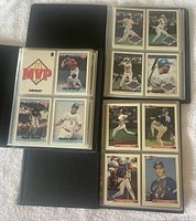 Open binder showing McDonald's MVP cards and 1992 Bowman Toronto Blue Jays cards in plastic sleeves.