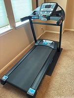 Full view of XTERRA TR3.0 treadmill from the front left angle showing running belt, handrails, and console.