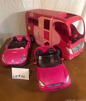 Front view of all three Barbie vehicles