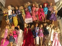 Group shot of all dolls laid out on table