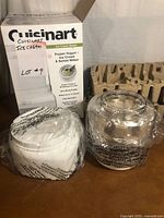 Complete unit with freezer bowl and lid wrapped