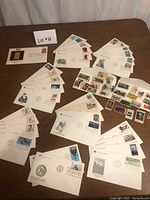 Overview of all first day covers, loose stamps on stock card and mounted stamp card