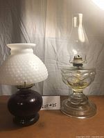 Both hurricane lamps side by side