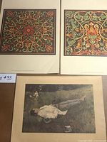 All three prints laid out: two floral pattern prints on top, Wyeth Blueberry Picker print below