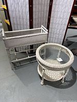 Side table and plant stand shown together, highlighting overall size and design.