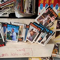 Close-up of assorted baseball cards showing different teams and players