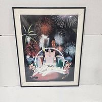 Front view of framed Disneyland 30th Anniversary print with fireworks and castle