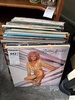 Photo showing stack of vinyl records with Barbara Mandrell album on top.
