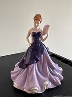 Front view showing purple bodice and lavender-pink skirt