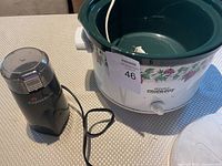 Photo of Espressione coffee grinder and Rival Crock-Pot set showing both items and their power cords.