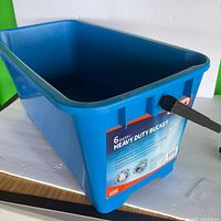 Full view of blue Unger heavy duty bucket