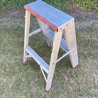 Full view of folded aluminum step ladder