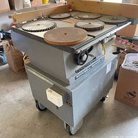 Full view of Rockwell Beaver table saw with blades on tabletop