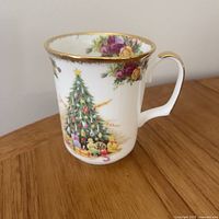 Front view of mug showing Christmas tree design
