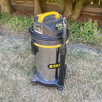 Full view of Stanley wet/dry vacuum outdoors