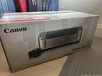 Side view of sealed Canon Pixma PRO-100 box with branding