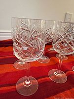Close view of cut crystal design on stems and bowls