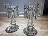Front view showing both luster candle holders with hanging prisms