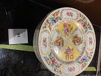 Stack of 8 Schumann Royal Bavarian Dresdener porcelain plates showing detailed floral and gold decoration.