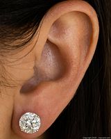 Single stud earring worn on ear, showing size and appearance when worn