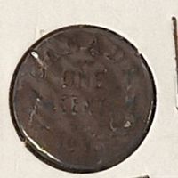 Close-up image of the 1933 Canadian 1 cent coin showing 'ONE CENT 1933' on the face with visible wear and dark patina.