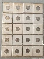 Multiple photos showing 20 Canadian 5 cent coins in individual 2x2 holders with visible years ranging from 1963 to 1968.