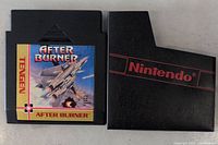 Front view of After Burner NES game cartridge with label artwork and Nintendo black dust sleeve