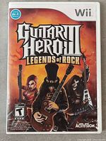 Front cover of Guitar Hero III Legends of Rock Nintendo Wii game case showing cover art and rating.