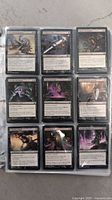 Page of 9 black-bordered Magic The Gathering cards in sleeves, featuring various characters and spells.