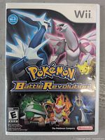 Front cover of Pokemon Battle Revolution game for Wii showing characters and Nintendo branding.