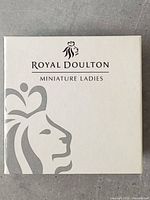 White Royal Doulton Miniature Ladies box with lion head logo and text
