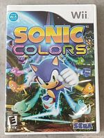 Front cover of the Sonic Colors game case for Nintendo Wii showing Sonic and colorful Wisps.
