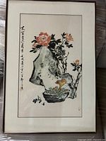 Full view of the framed Chinese print showing floral imagery and calligraphy