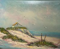 Front view of oil on canvas seascape painting showing house on dune, seagulls, ocean and beach scene.