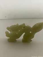 Front view of carved jade dragon