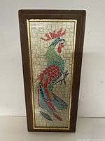 Full view of framed mosaic rooster art, vertical orientation