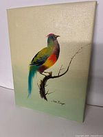 Full view of signed oil painting showing bird on branch